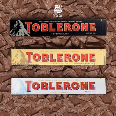 SOCOLA MẬT ONG TOBLERONE SWISS CHOCOLATE WITH HONEY AND ALMOND NOUGAT CỦA THỤY SĨ MỖI THANH 100GR